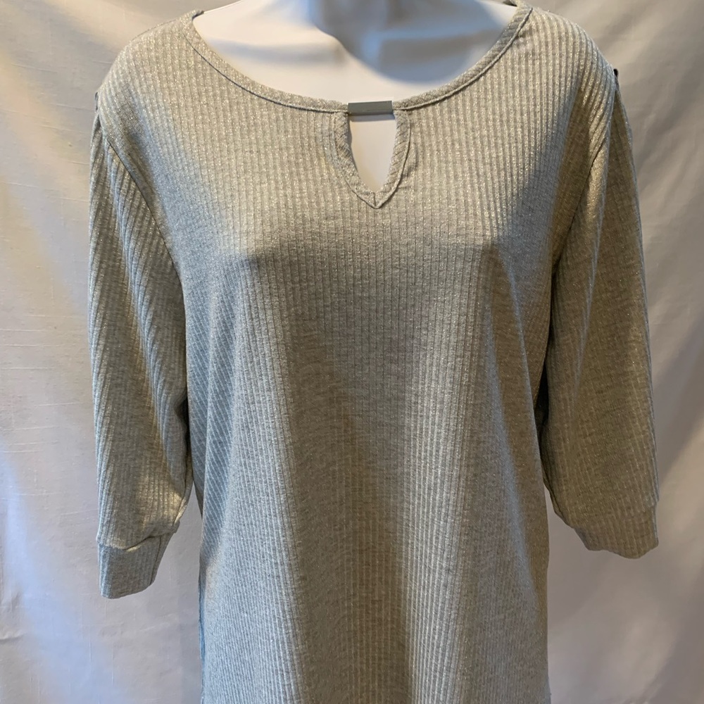 Time to shine in this Lurex keyhole neck sweater!